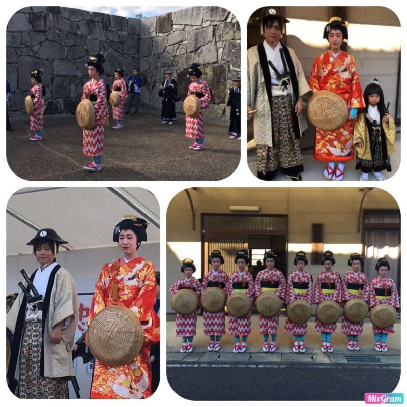 a group of people in traditional japanese clothing